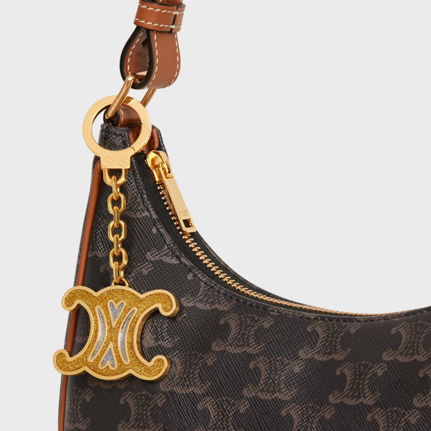 mulheres acessórios CELINE Amuleto de glitter coração triomphe em latão e esmalte ouro T204R530