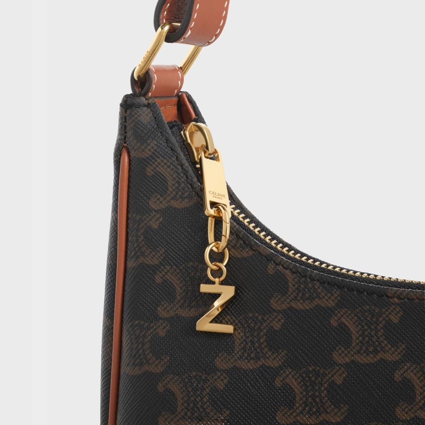 mulheres acessórios CELINE charme z em latão ouro T204R546